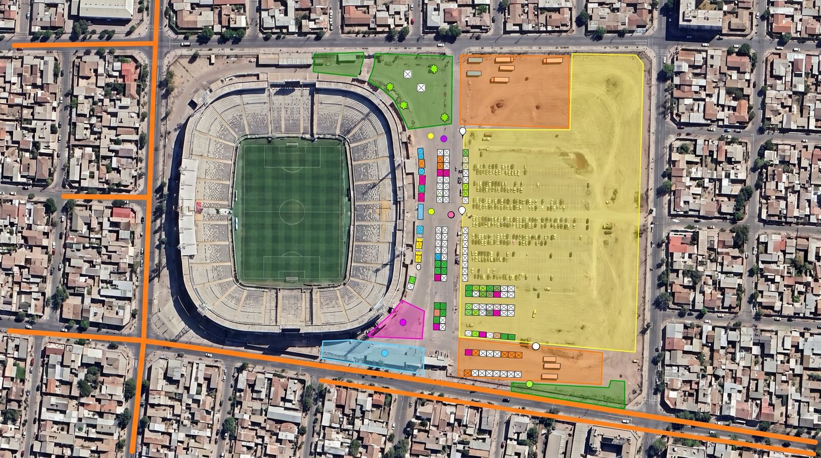 Vista satelital del Estadio Monumental con la explanada marcada como estacionamiento, zonas de logística y las hileras de stands de la feria